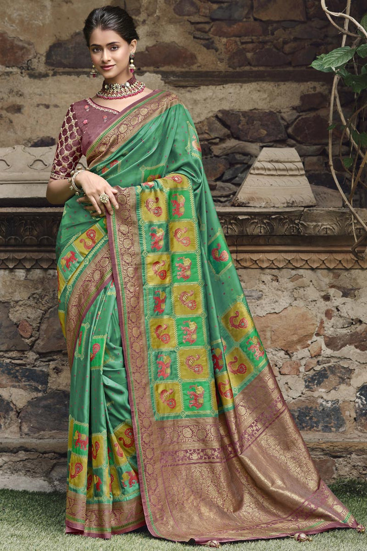 Weaving Work Silk Fabric Green Color Enticing Saree