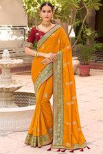 Load image into Gallery viewer, Art Silk Fabric Yellow Color Embroidery Border Work Traditional Saree
