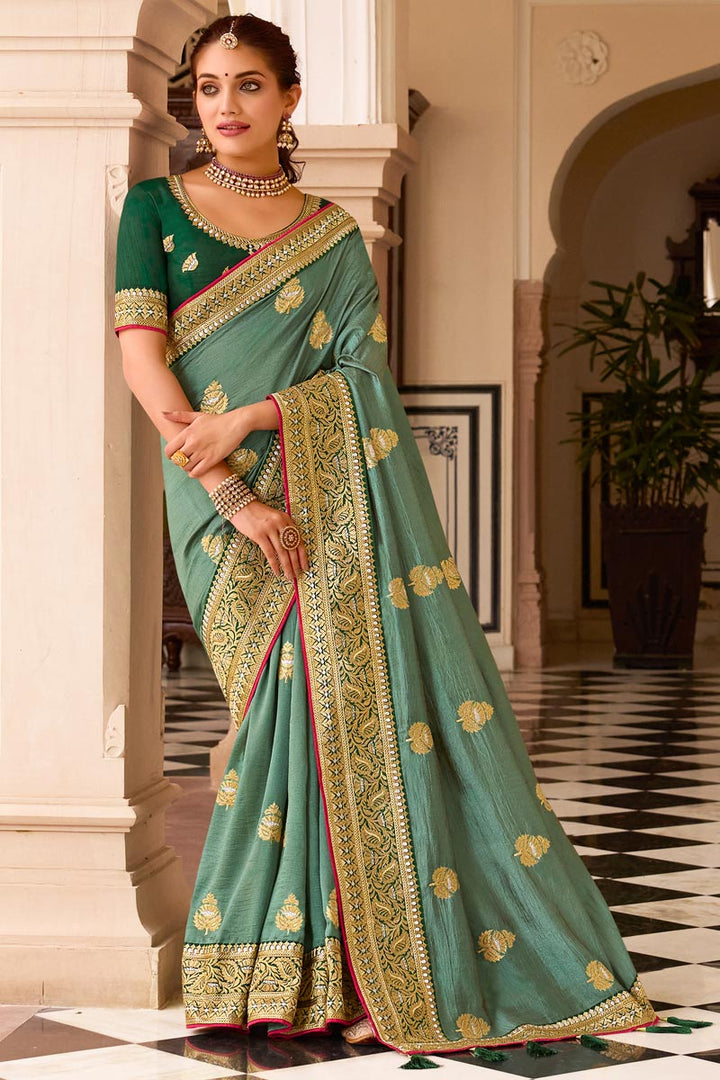 Art Silk Fabric Classic Sea Sea Green Color Embroidery Border Work Saree