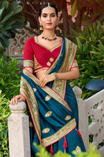 Load image into Gallery viewer, Beguiling Embroidery Border Work Teal Color Art Silk Saree
