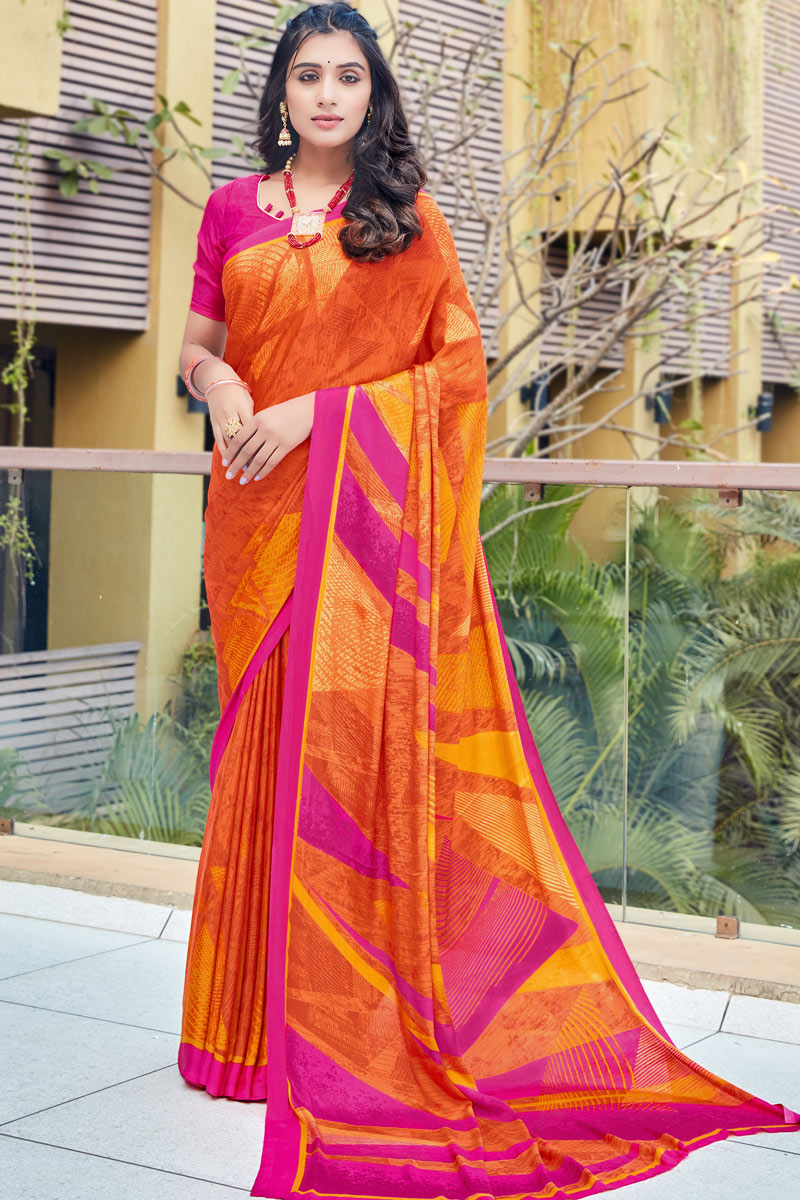 Attractive Crepe Fabric Orange Color Casual Wear Saree With Printed Work