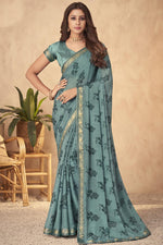 Load image into Gallery viewer, Teal Color Ravishing Georgette Saree With Printed Work
