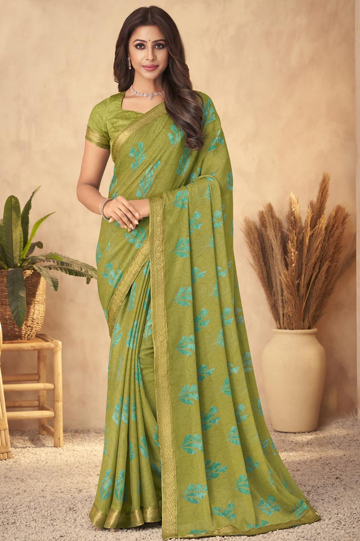 Excellent Mehendi Green Color Georgette Saree With Printed Work