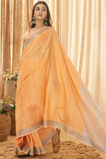 Load image into Gallery viewer, Tempting Linen Fabric Orange Color Saree With Weaving Work

