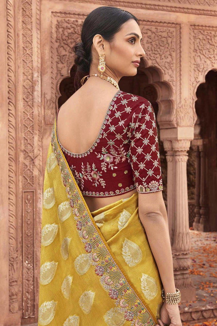 Amazing Embroidered Work On Yellow Color Tissue Silk Saree