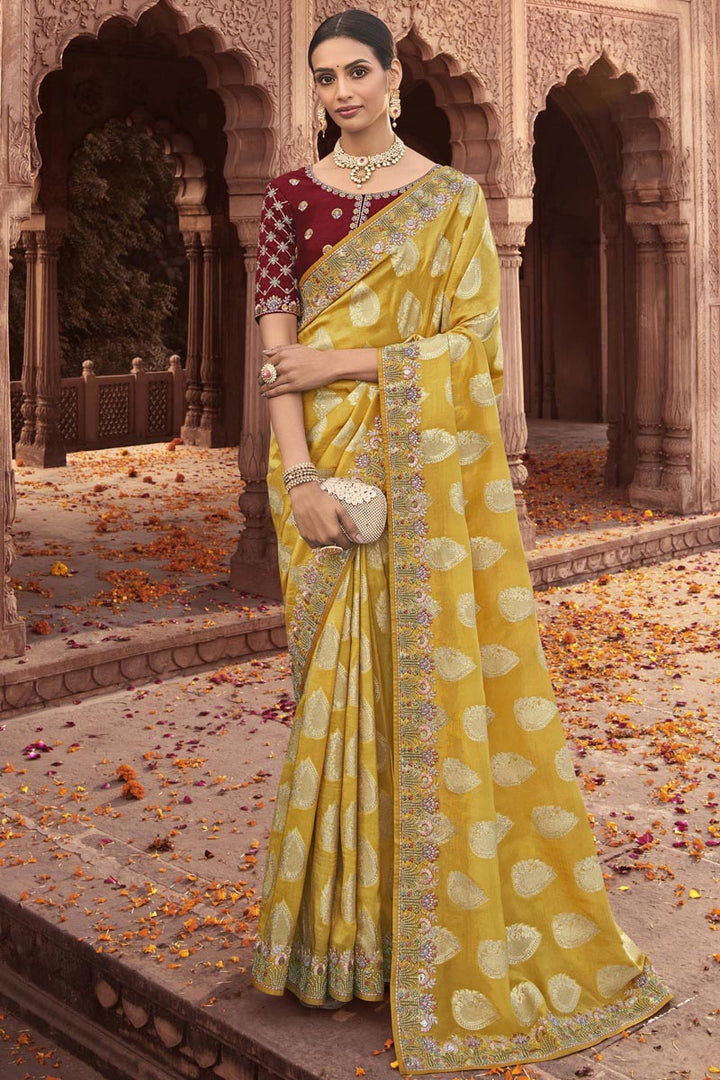 Amazing Embroidered Work On Yellow Color Tissue Silk Saree