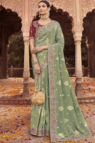 Incredible Embroidered Work On Green Color Tissue Silk Saree