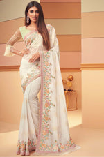 Load image into Gallery viewer, Marvelous Embroidered Work On Georgette Silk Fabric Party Wear Saree In Cream Color
