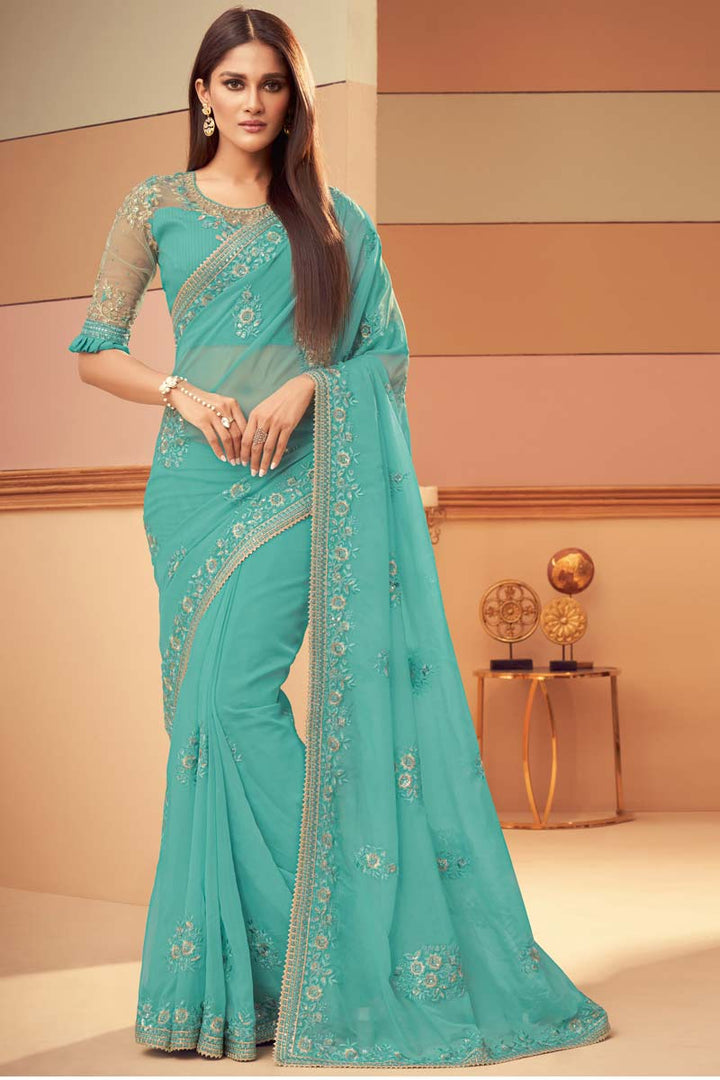 Cyan Color Party Wear Georgette Silk Flamboyant Saree With Embroidered Work