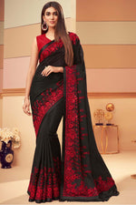 Load image into Gallery viewer, Beguiling Embroidered Work On Black Color Georgette Silk Fabric Party Wear Saree
