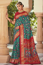 Load image into Gallery viewer, Winsome Art Silk Fabric Green Color Foil Printed Saree
