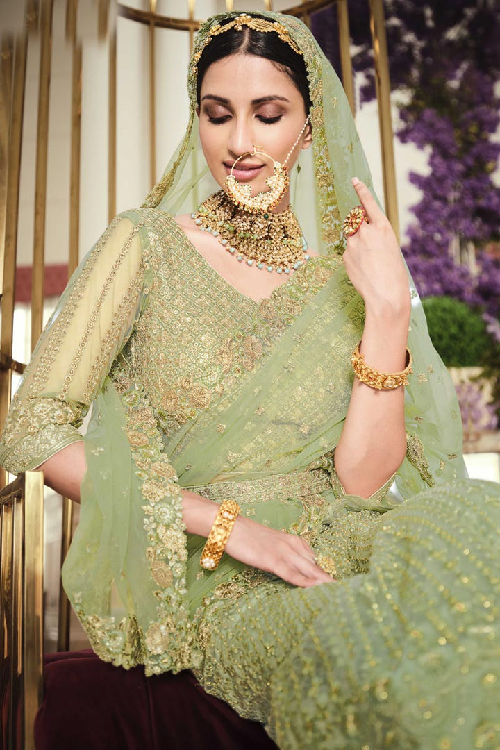 Net Embroidered Wedding Wear Lehenga Choli In Sea Green Color