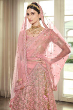 Load image into Gallery viewer, Pink Color Net Fabric Heavy Embroidered Wedding Wear Lehenga Choli
