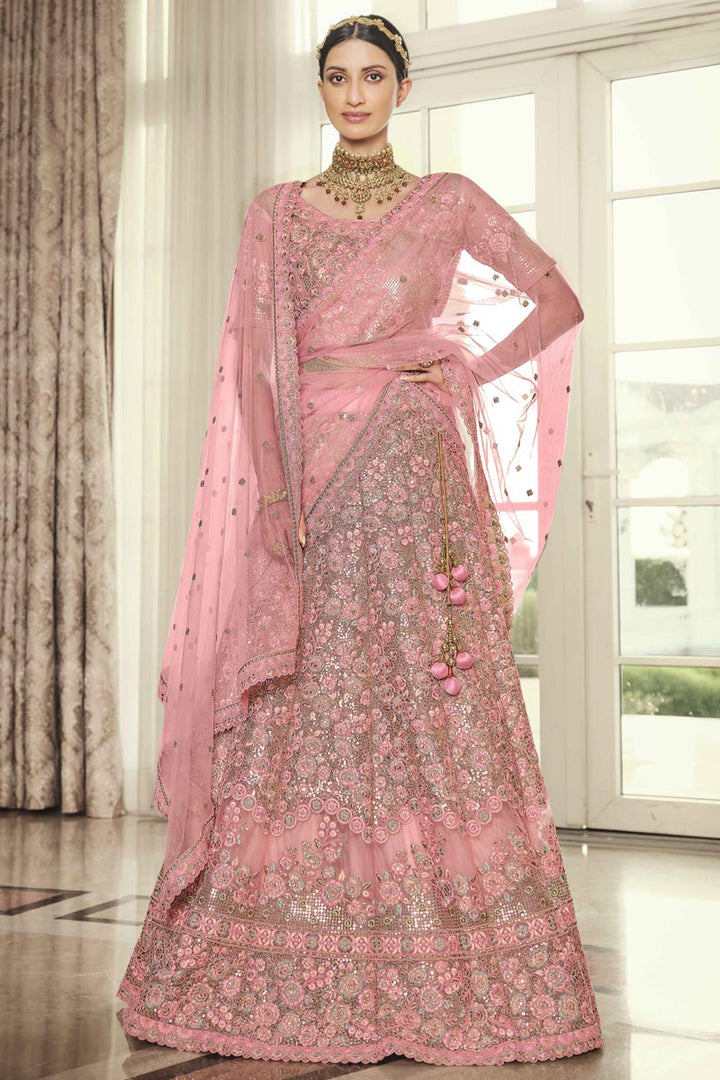 Pink Color Net Fabric Heavy Embroidered Wedding Wear Lehenga Choli