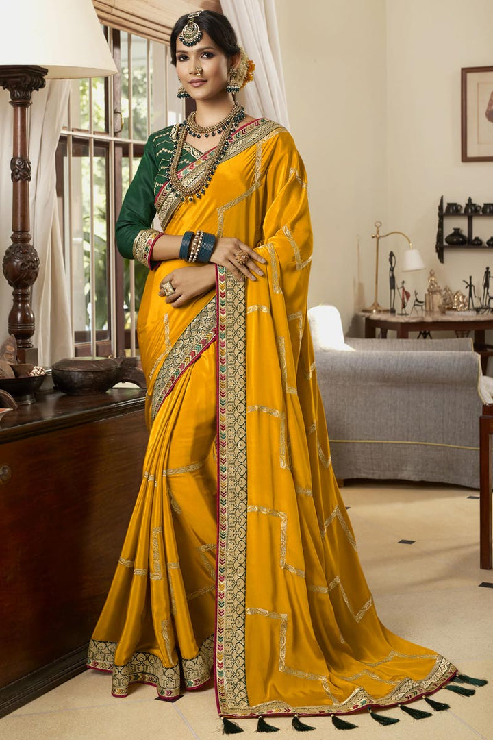 Party Wear Crepe Silk Fabric Embroidered Saree In Yellow Color