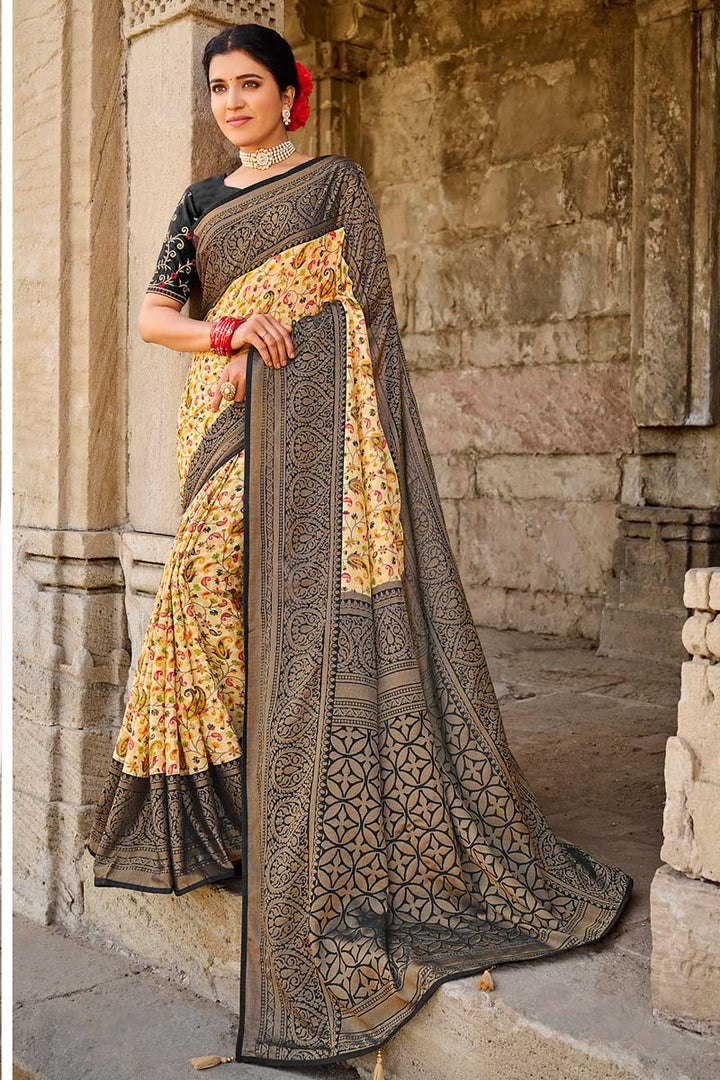 Special Brasso Fabric Festival Wear Cream Color Saree With Embroidered Blouse