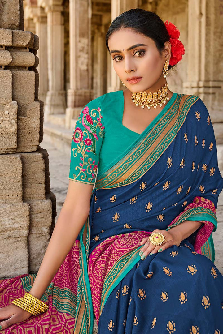 Dreamy Brasso Fabric Festival Wear Saree With Embroidered Blouse In Blue Color