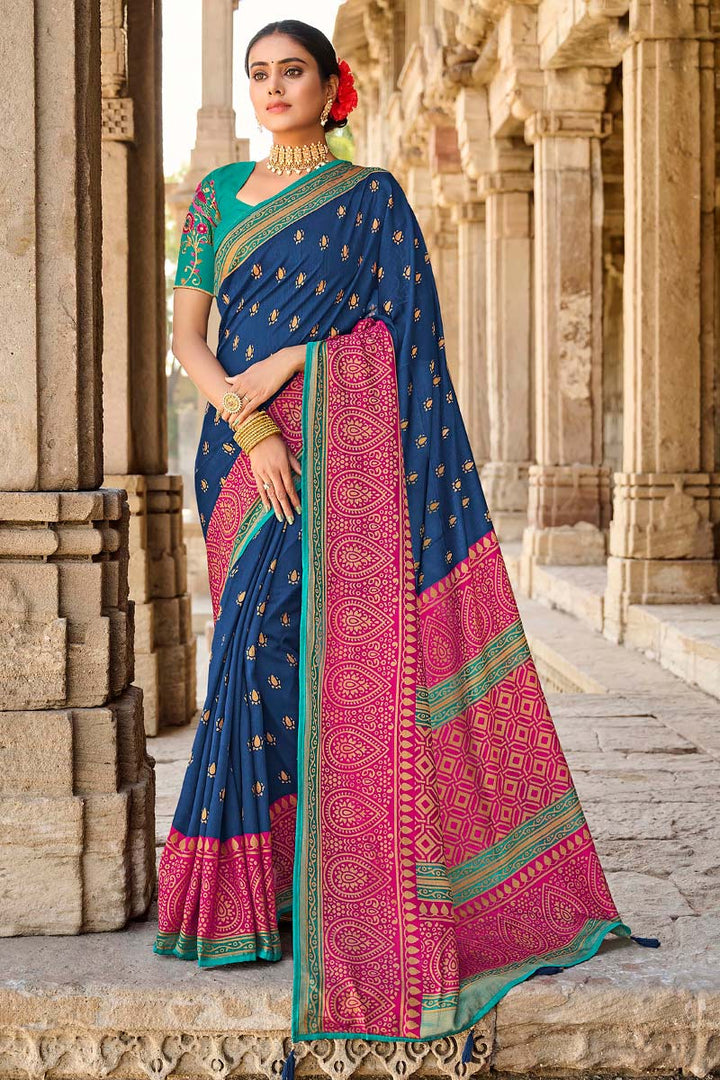 Dreamy Brasso Fabric Festival Wear Saree With Embroidered Blouse In Blue Color