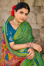 Load image into Gallery viewer, Green Color Coveted Brasso Fabric Festival Wear Saree With Embroidered Blouse
