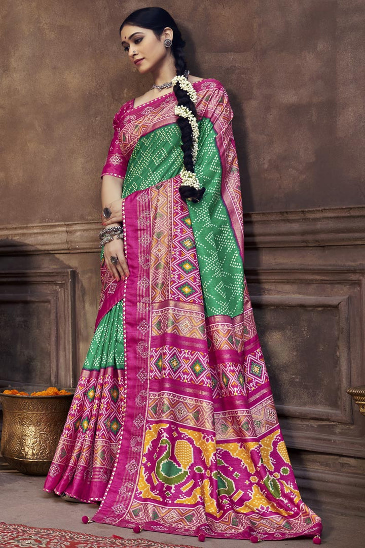 Art Silk Fabric Patola Printed Sangeet Wear Wonderful Saree In Green Color