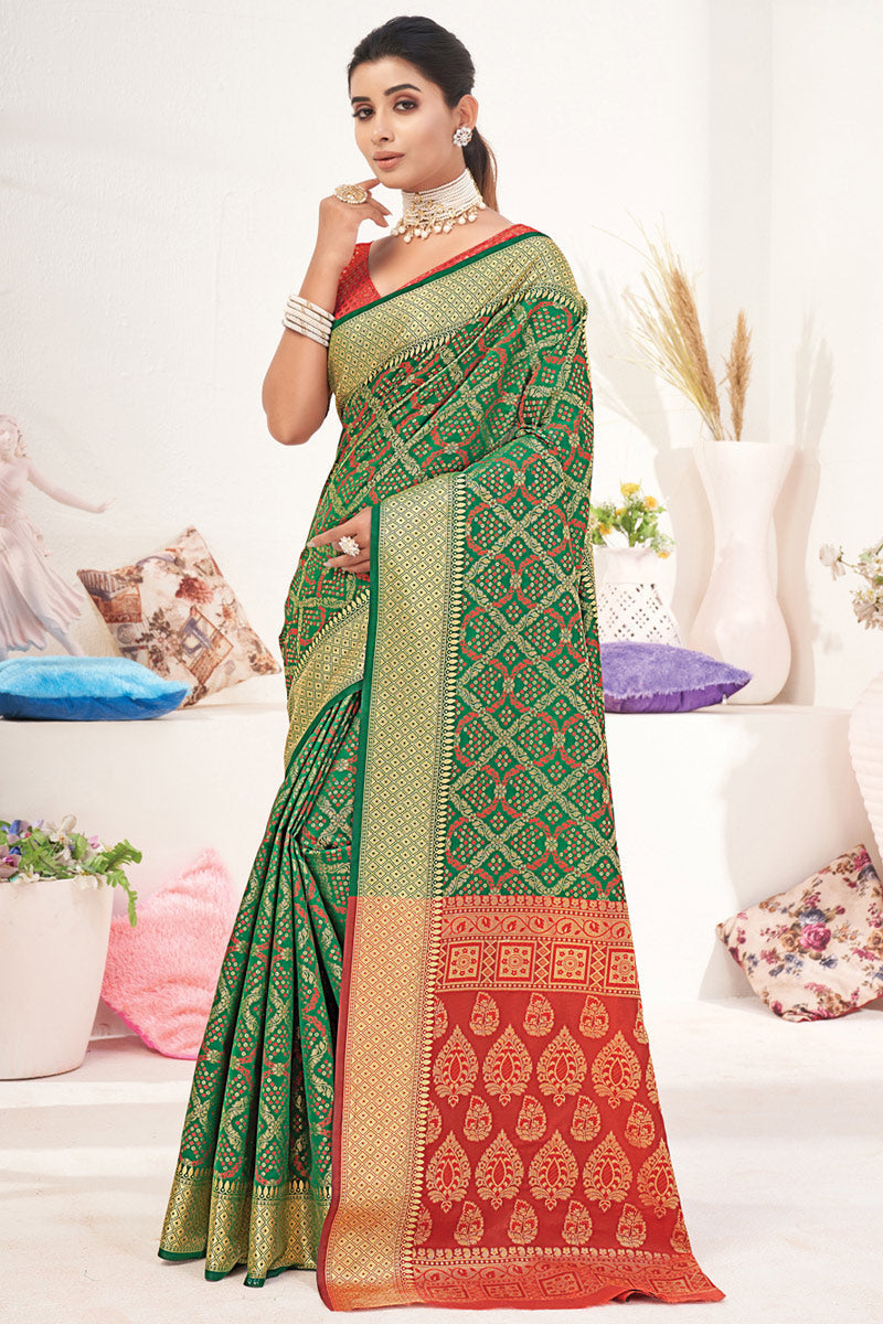 Excellent Patola Style Art Silk Fabric Green Color Festival Wear Saree With Jacquard Work