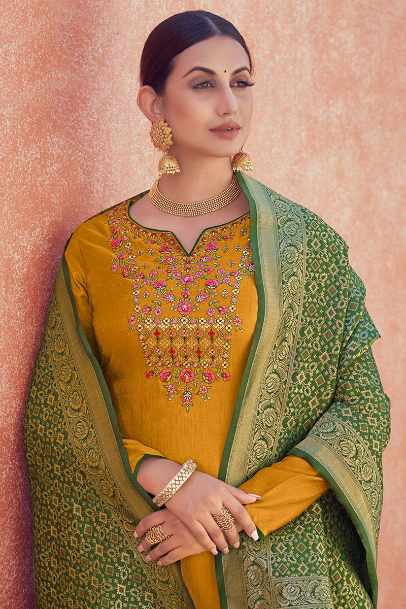 Mustard Color Fancy Fabric Beautiful Festival Wear Salwar Suit With Embroidered Work