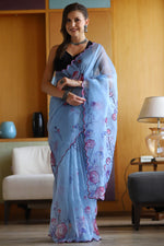 Load image into Gallery viewer, Organza Fabric Sky Blue Color Party Style Tempting Saree
