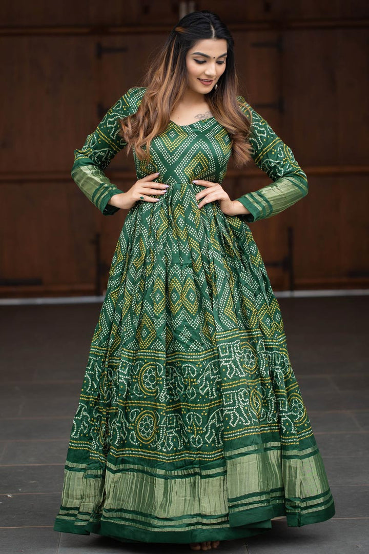 Art Silk Fabric Gorgeous Bandhej Printed Gown In Green Color