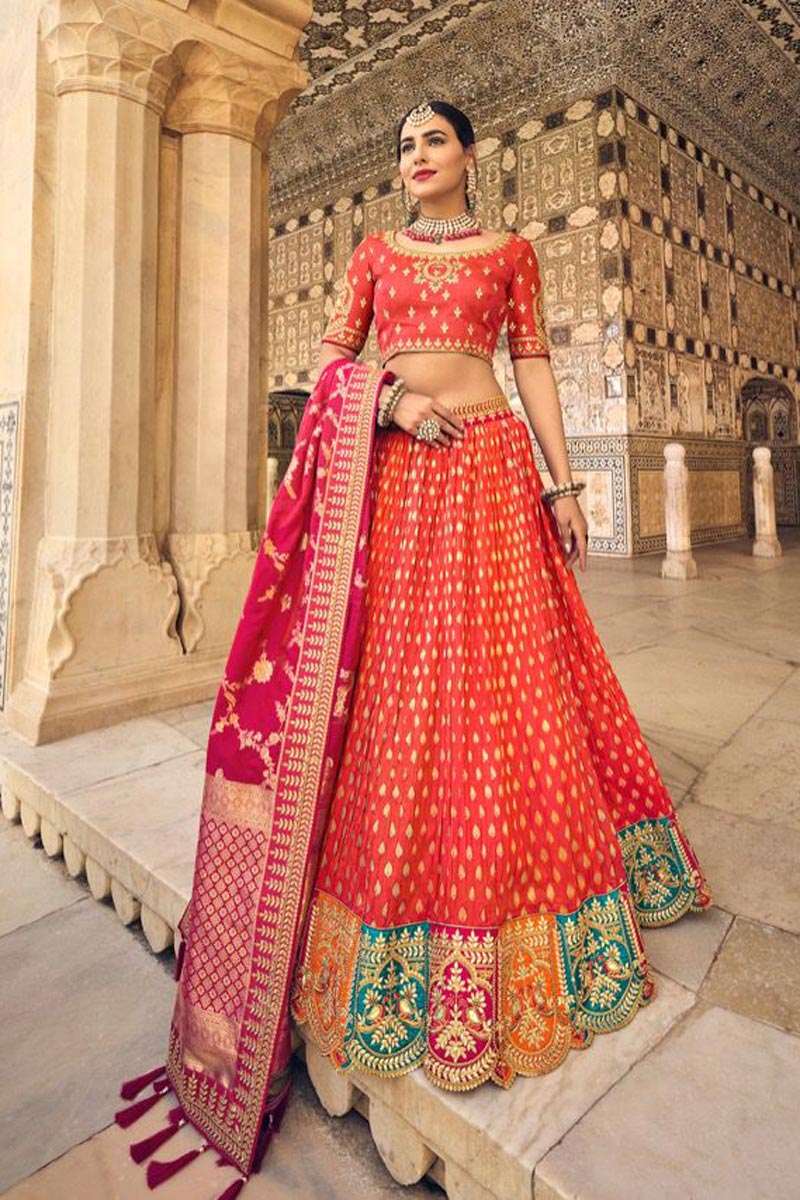 Banarasi Silk Fabric Orange Color Fantastic Lehenga In Wedding Wear