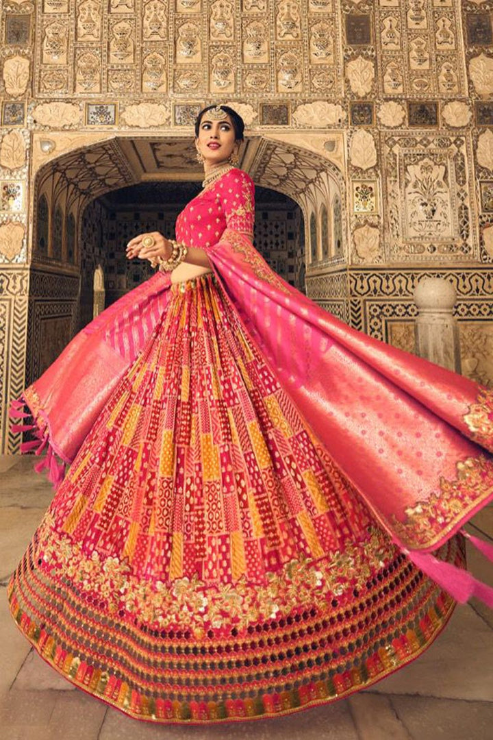 Wedding Wear Rani Color Banarasi Silk Fabric Charming Lehenga