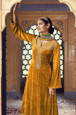 Load image into Gallery viewer, Mustard Color Velvet Fabric Salwar Suit With Coveted Embroidered Work
