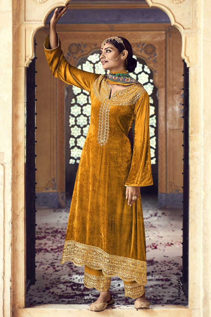 Mustard Color Velvet Fabric Salwar Suit With Coveted Embroidered Work