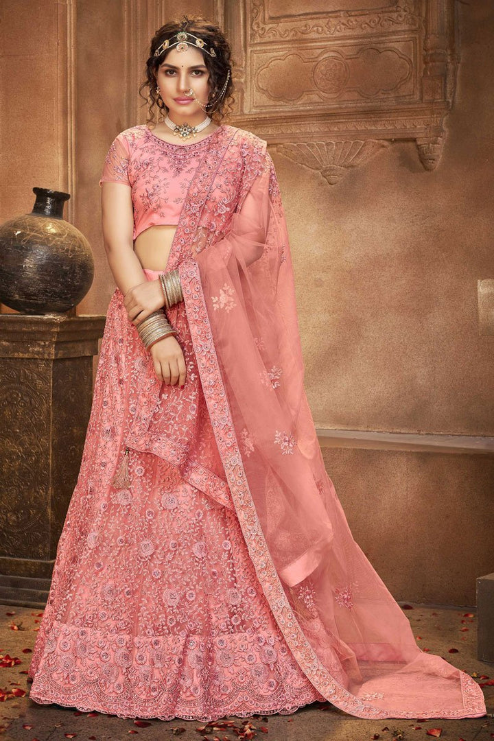 Sangeet Wear Peach Color Net Fabric Designer Lehenga Choli