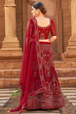 Load image into Gallery viewer, Stunning Net Fabric Maroon Color Function Wear Lehenga
