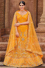 Load image into Gallery viewer, Net Fabric Brilliant Function Wear Lehenga In Yellow Color
