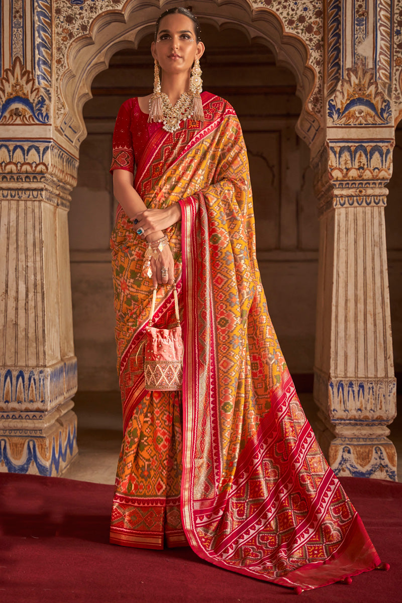 Delicate Mustard Color Printed Patola Silk Saree