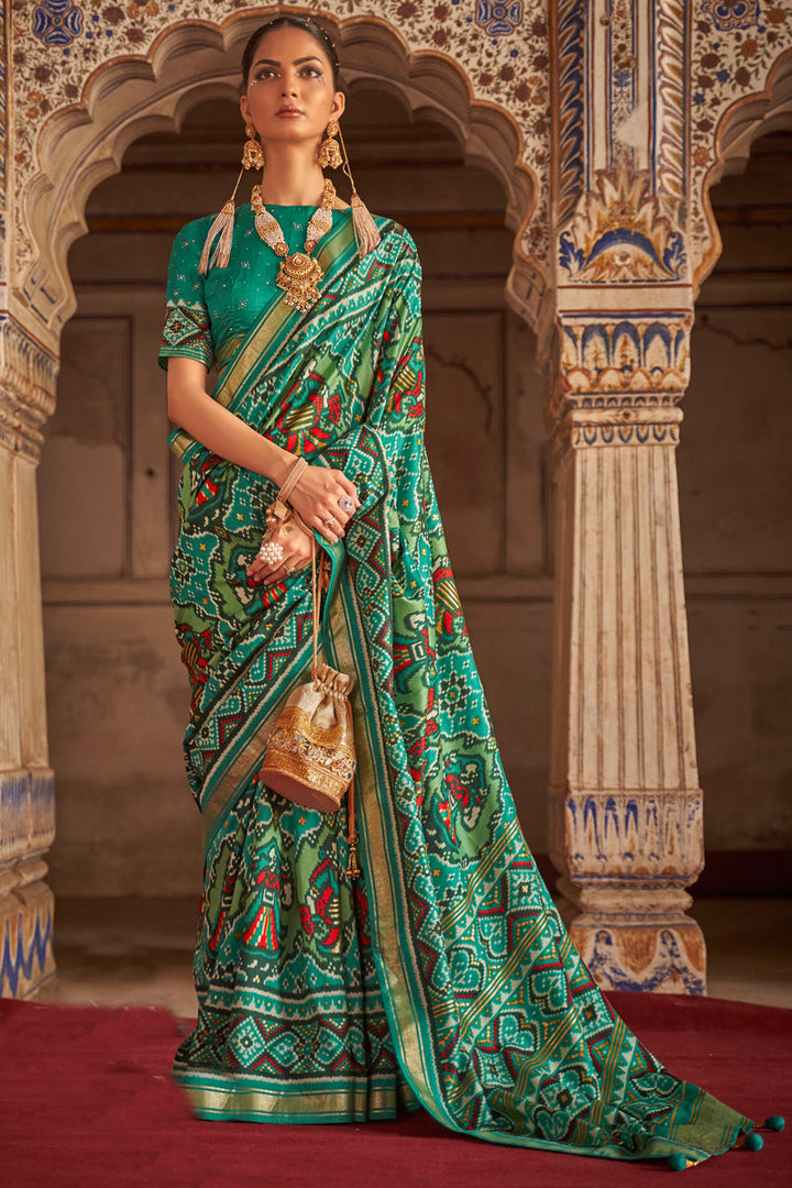 Attractive Printed Patola Silk Saree In Green Color