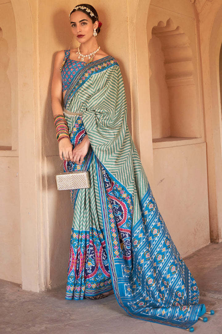 Art Silk Fabric Cyan Color Excellent Printed Work Patola Saree