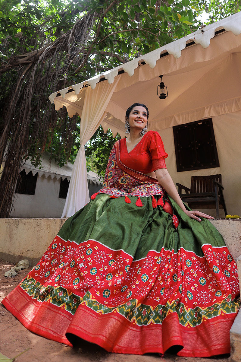 Foil Printed Designs On Mehendi Green Color Lehenga Choli In Dola Silk Fabric