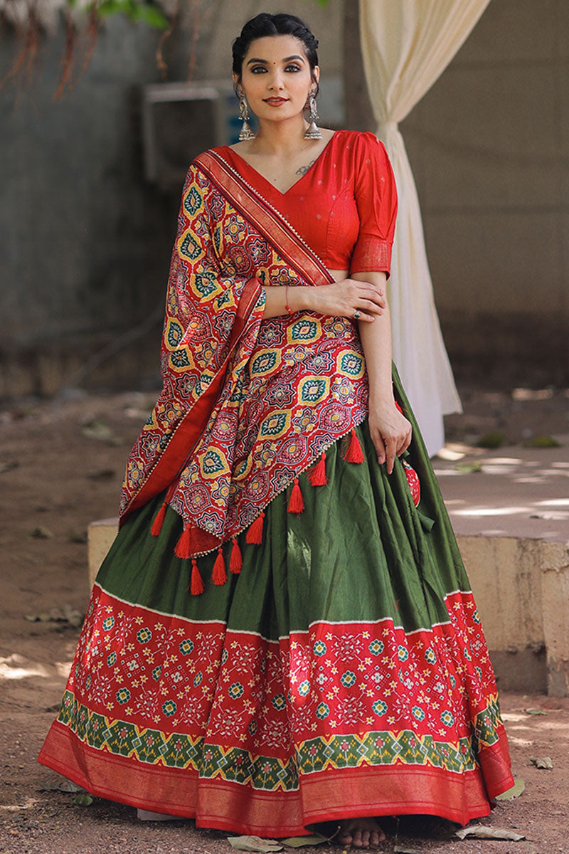Foil Printed Designs On Mehendi Green Color Lehenga Choli In Dola Silk Fabric