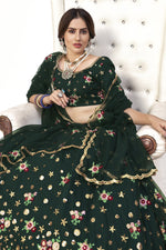 Load image into Gallery viewer, Attractive Sangeet Wear Dark Green Color Embroidered Lehenga In Net Fabric
