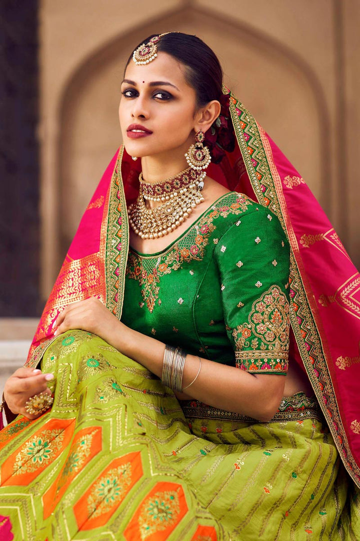 Graceful Silk Weaving Work Lehenga Choli In Green Color