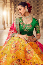 Load image into Gallery viewer, Mustard Color Silk Fabric Weaving Work Reception Wear Gorgeous Lehenga
