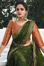 Load image into Gallery viewer, Mehendi Green Color Beautiful Georgette Saree With Border Work Featuring Asmita Sood
