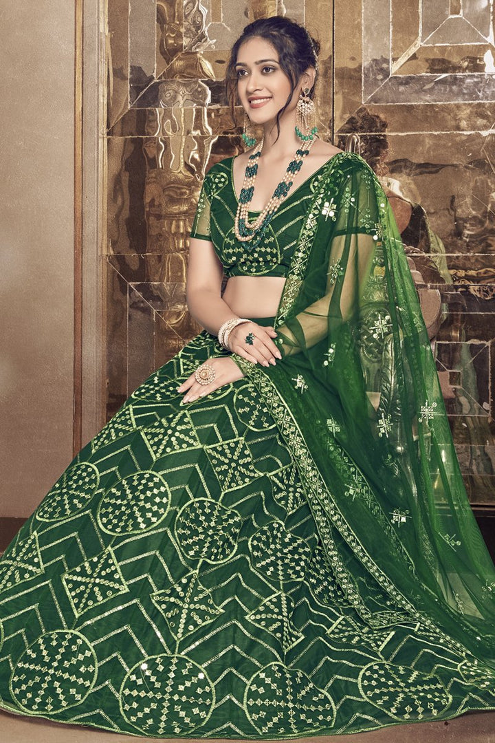 Net Fabric Sequins Work Wedding Wear Designer Lehenga Choli In Dark Green Color
