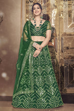 Load image into Gallery viewer, Net Fabric Sequins Work Wedding Wear Designer Lehenga Choli In Dark Green Color
