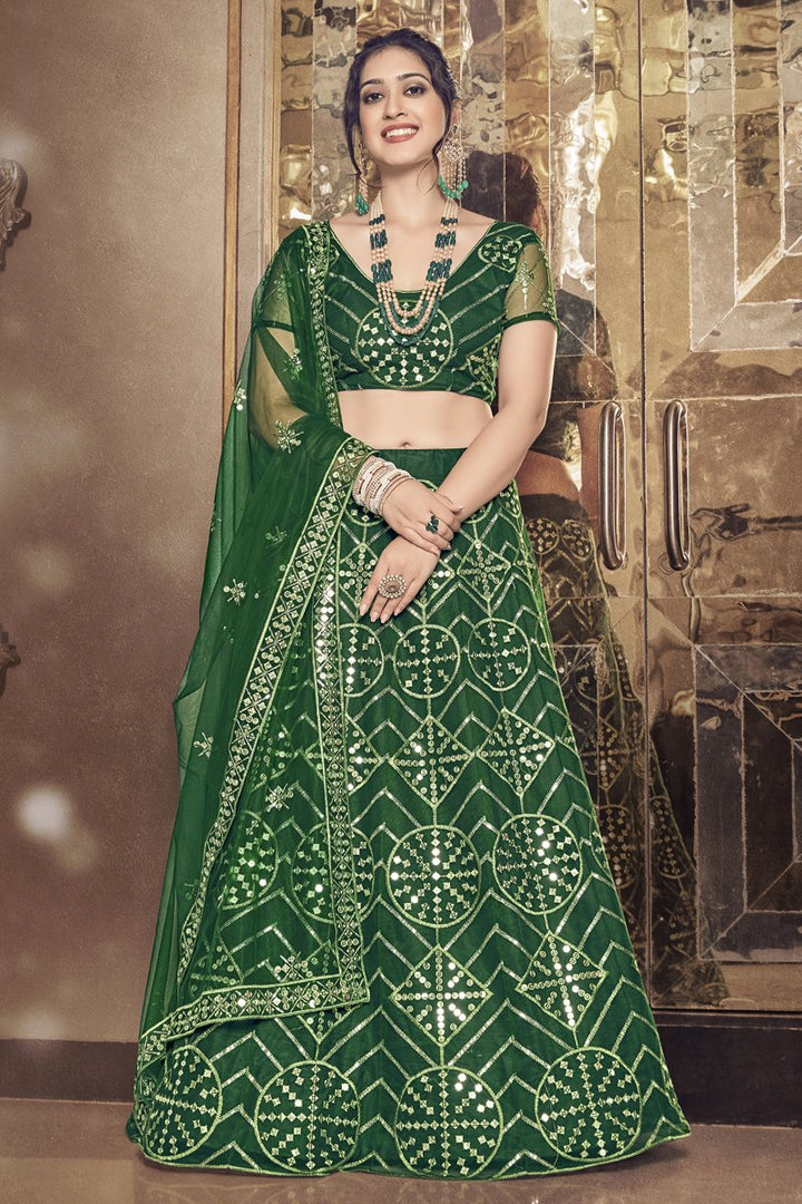 Net Fabric Sequins Work Wedding Wear Designer Lehenga Choli In Dark Green Color