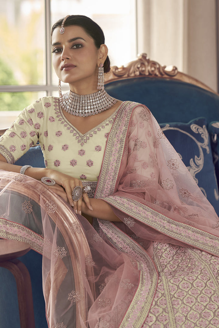 Striking Beige Color Thread Embroidered Sangeet Wear Lehenga Choli In Art Silk Fabric