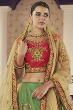 Load image into Gallery viewer, Lovely Green Color Jacquard Silk Fabric Thread Embroidered Reception Wear Lehenga Choli
