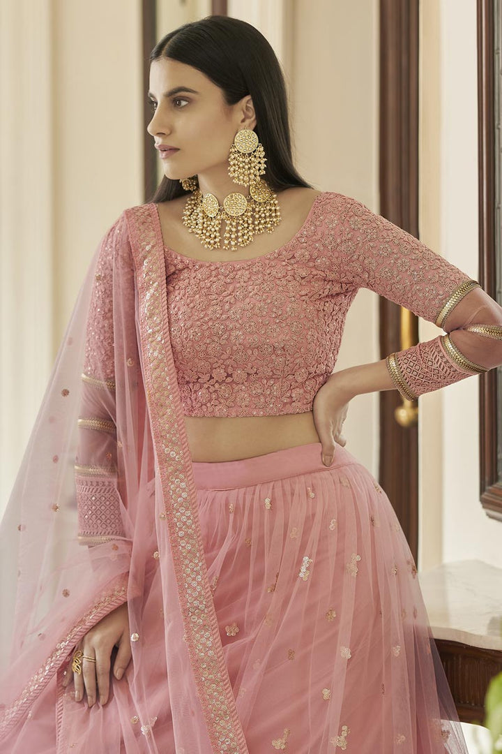 Chic Net Fabric Sangeet Wear Pink Color Embroidered Lehenga